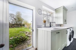 A charming 3/4 bedroom character cottage in a central village location